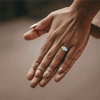Prsten od ružičastog zlata od 18 karata s tri kamena okruglog reza i prozirnim simuliranim dijamantom okruglog
